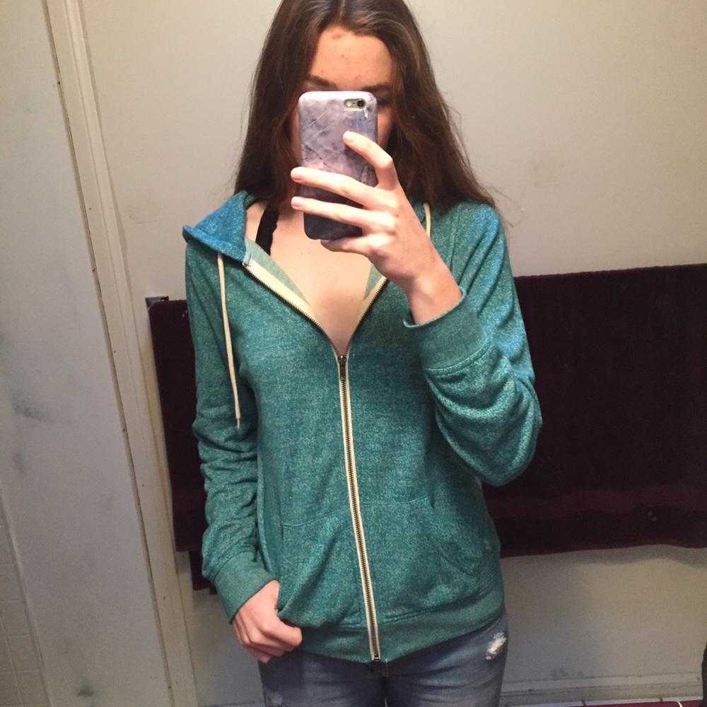 green zip up hoodie